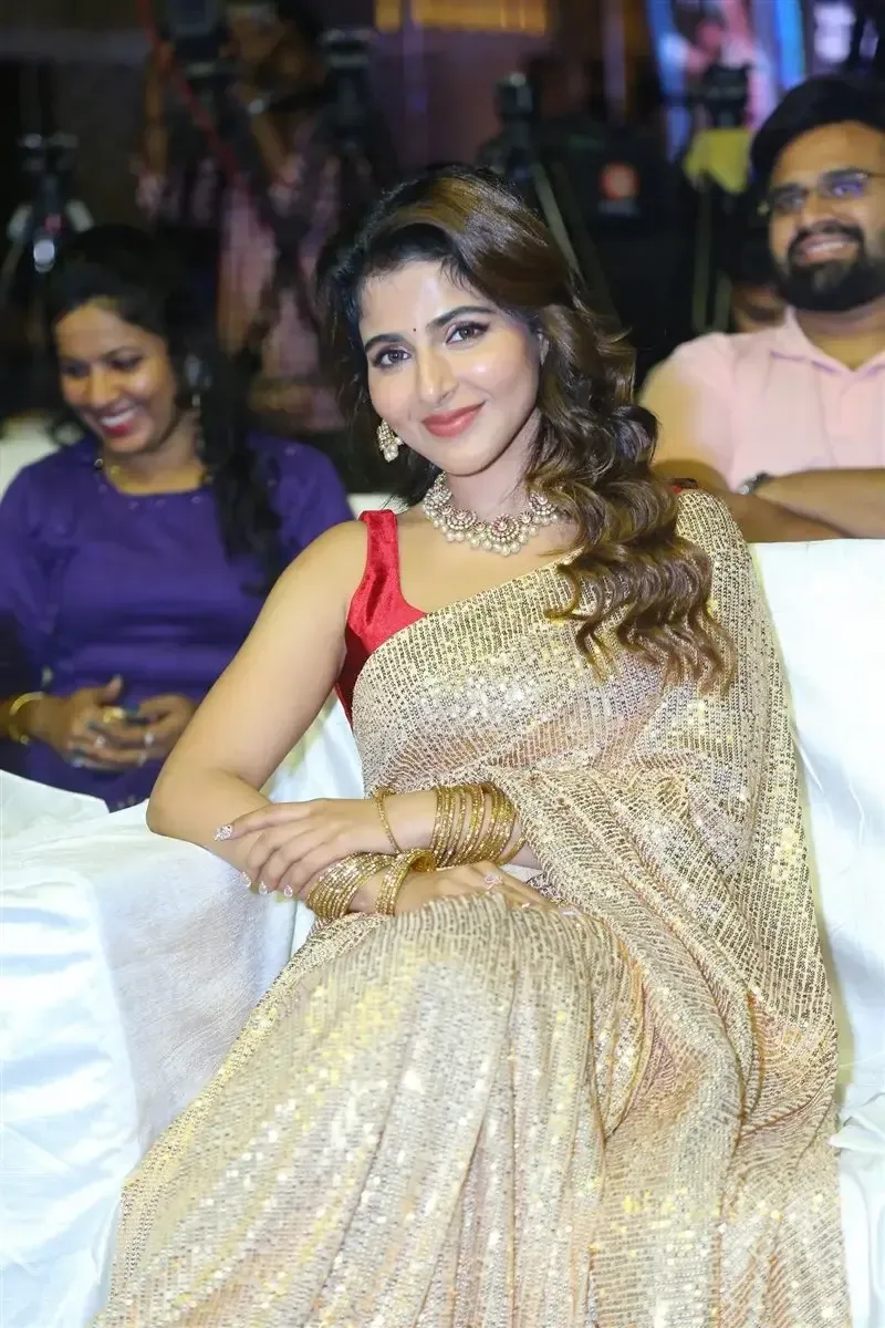 Iswarya Menon in Gold color Saree at Spy Movie Release Event